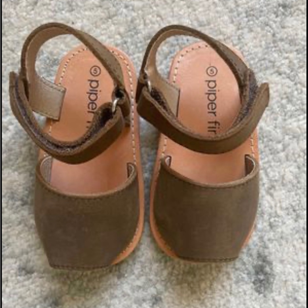 Size 5 baby/toddler shoes. New, never worn.